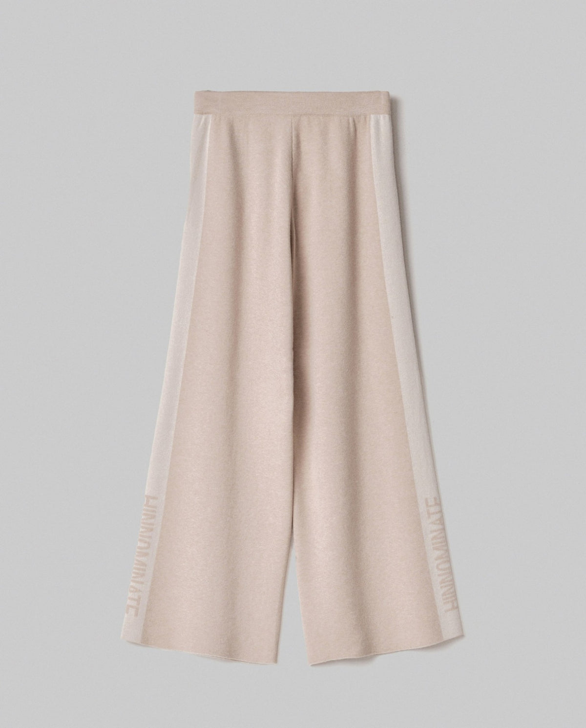 pantalone in maglia a palazzo con bande in contrasto e logo in punto rovescio beige sand hinnominate 
