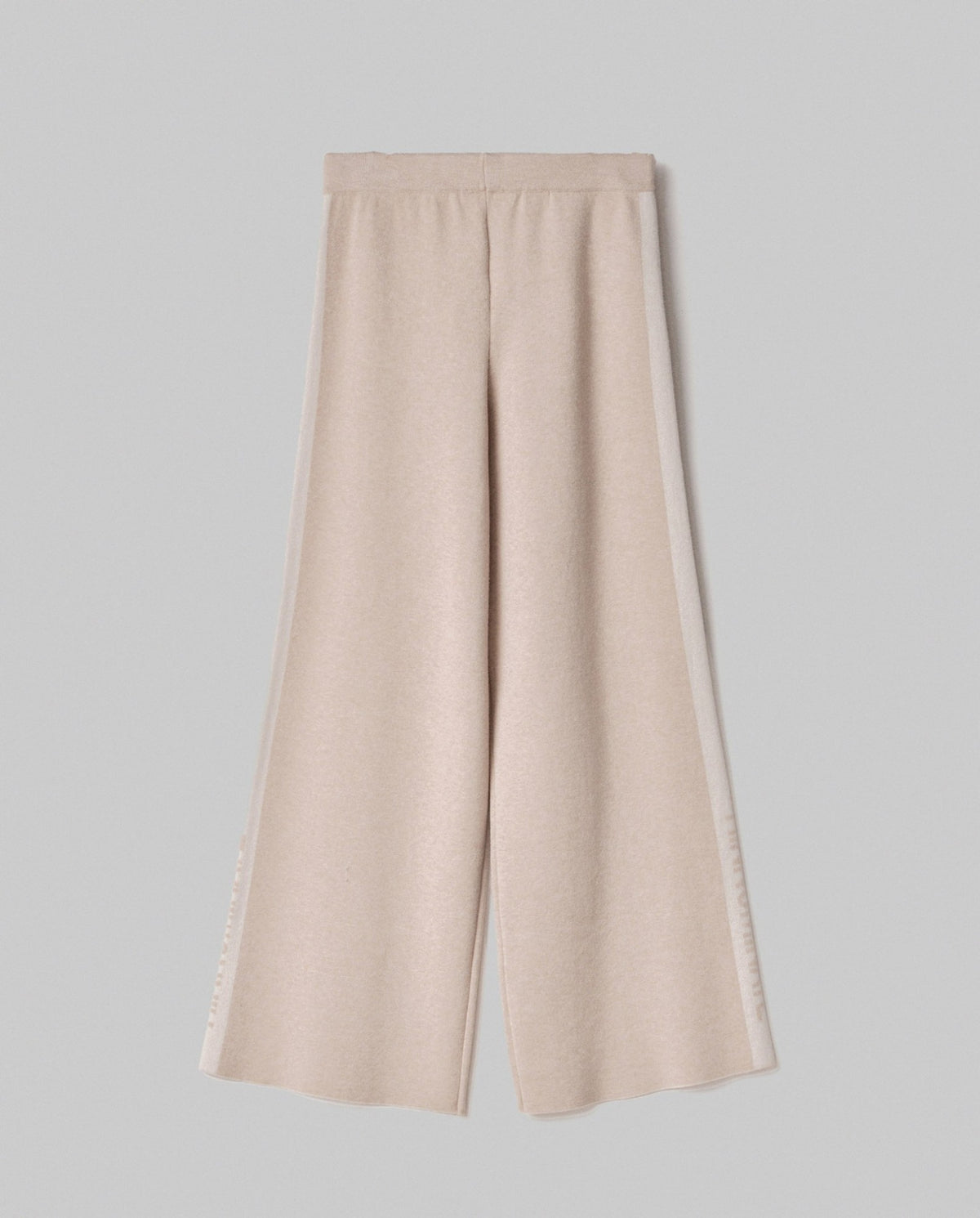 pantalone in maglia a palazzo con bande in contrasto e logo in punto rovescio beige sand hinnominate 