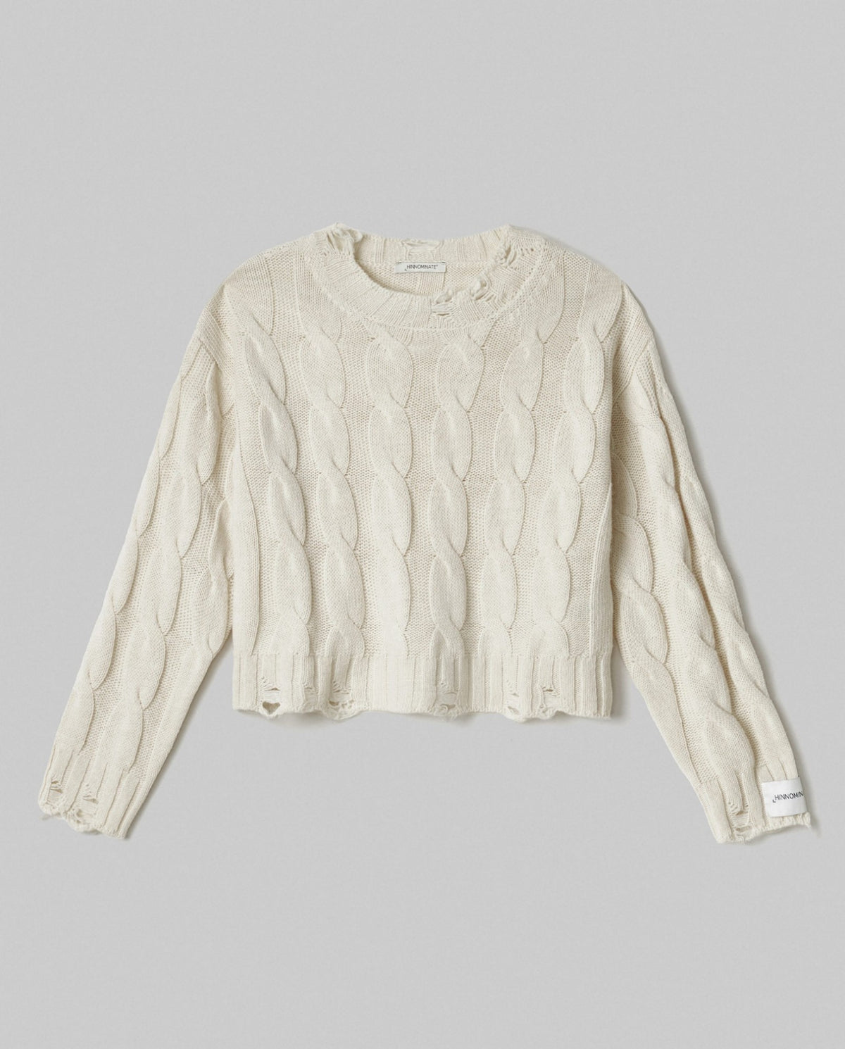maglia paricollo corta con trecce e rotture bianco burro hinnominate 