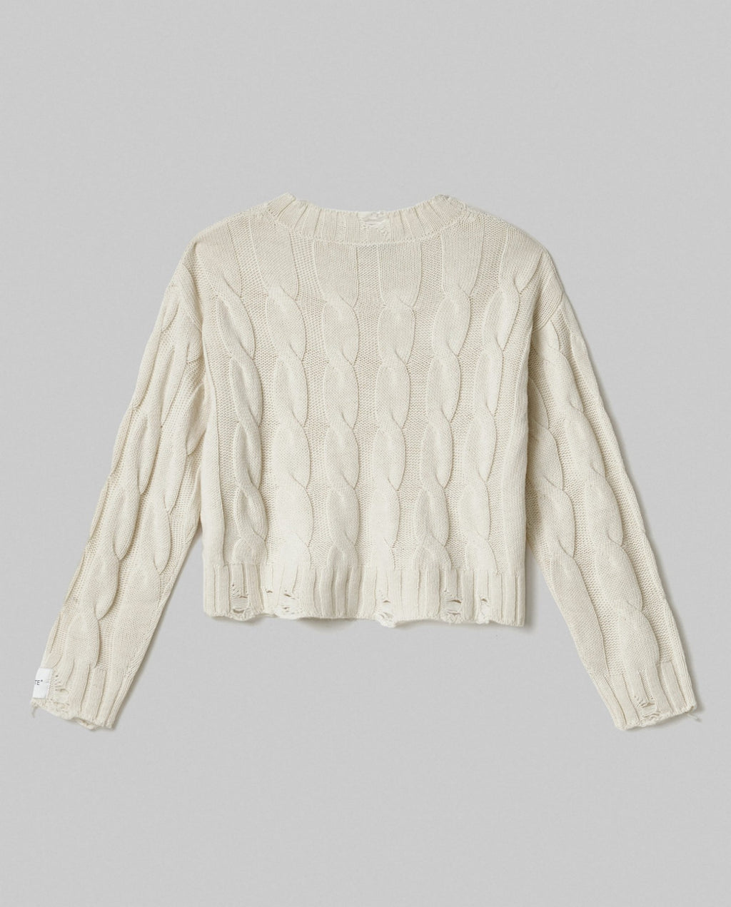 maglia paricollo corta con trecce e rotture bianco burro hinnominate 