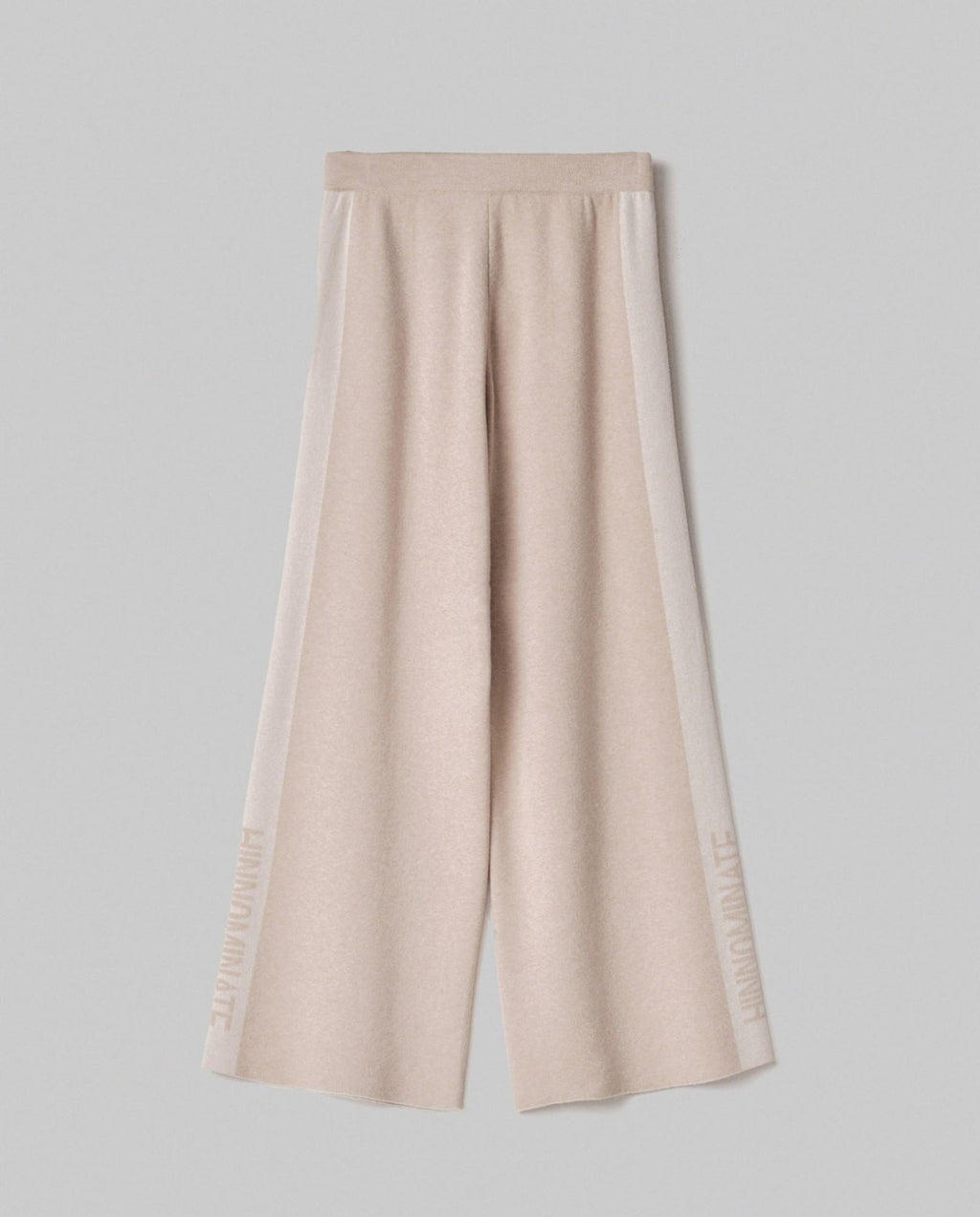 pantalone in maglia a palazzo con bande in contrasto e logo in punto rovescio beige sand hinnominate 