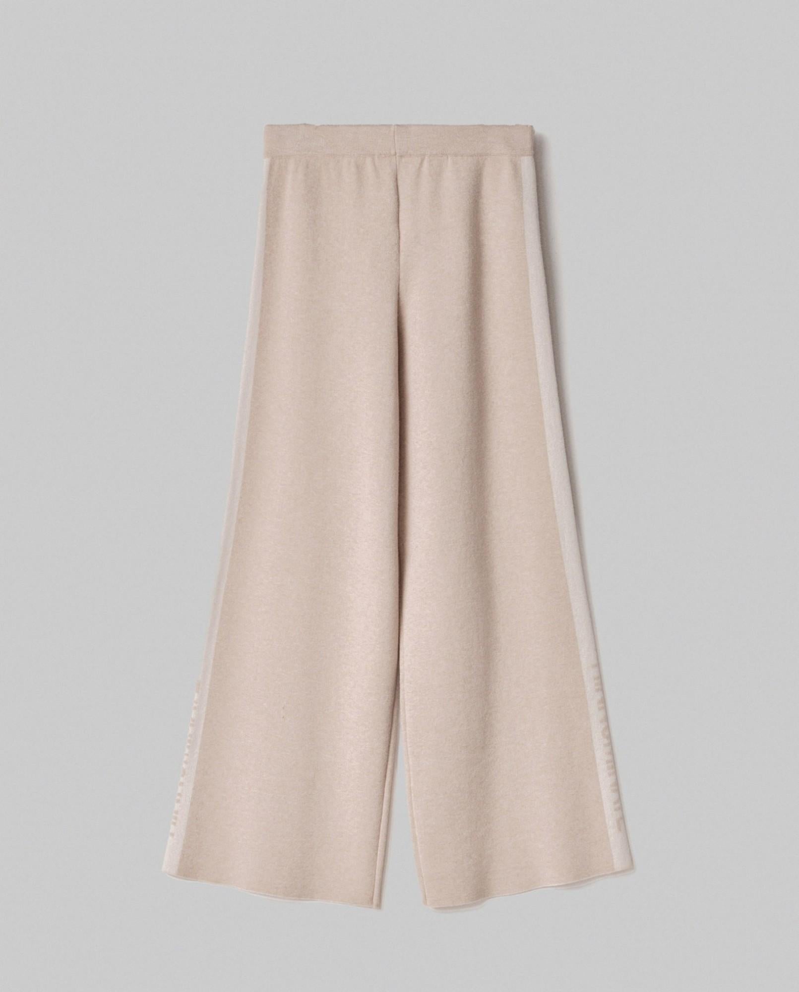 pantalone in maglia a palazzo con bande in contrasto e logo in punto rovescio beige sand hinnominate 