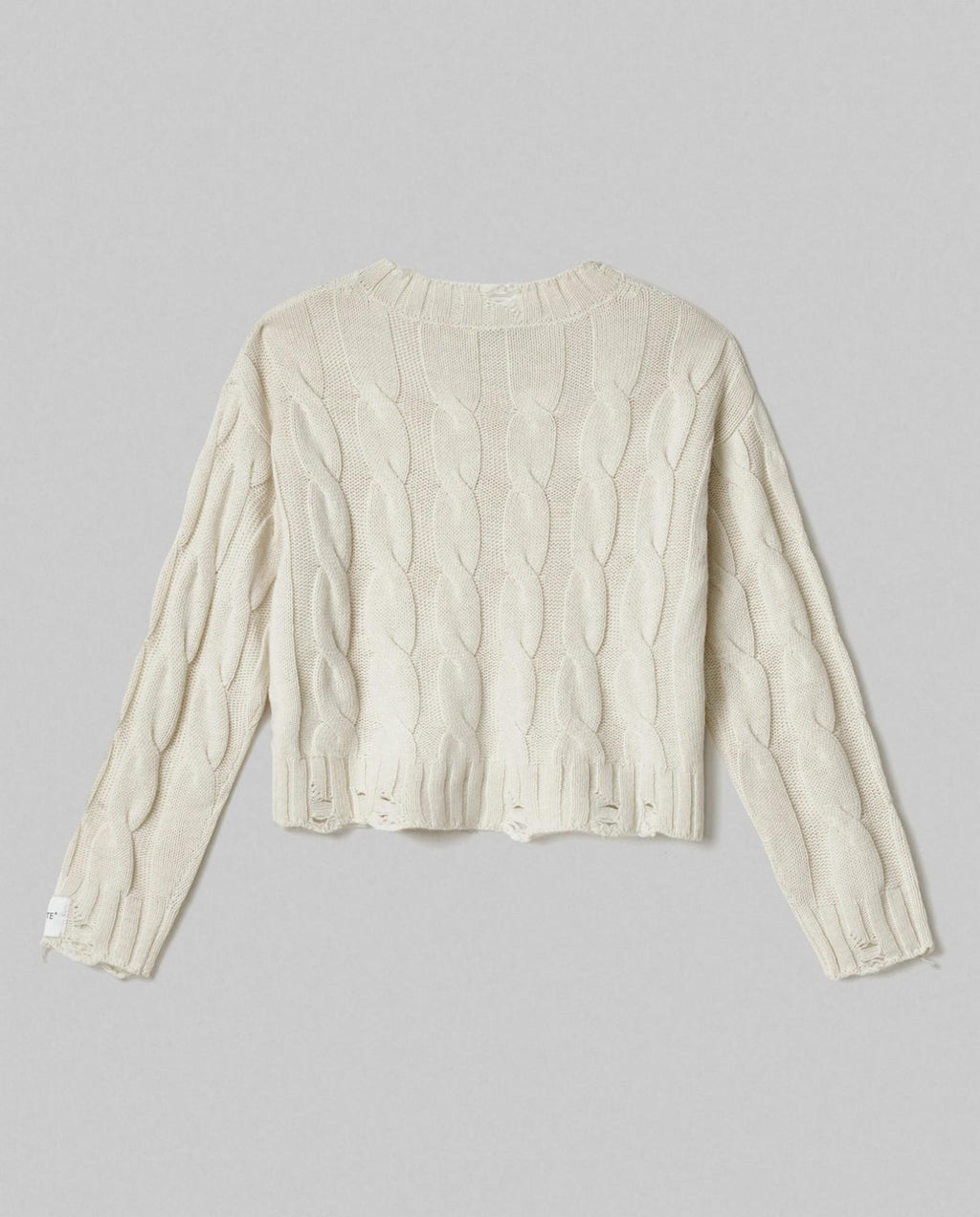 maglia paricollo corta con trecce e rotture bianco burro hinnominate 